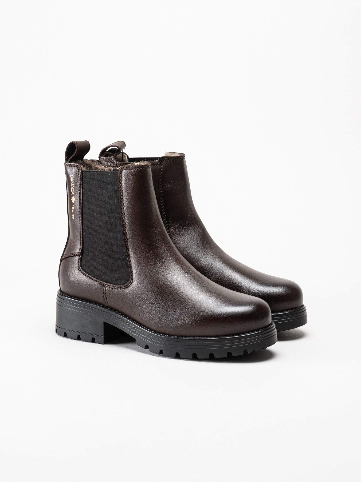 Canada Snow - Kimberly - Mörkbruna boots med fårskinn och broddar