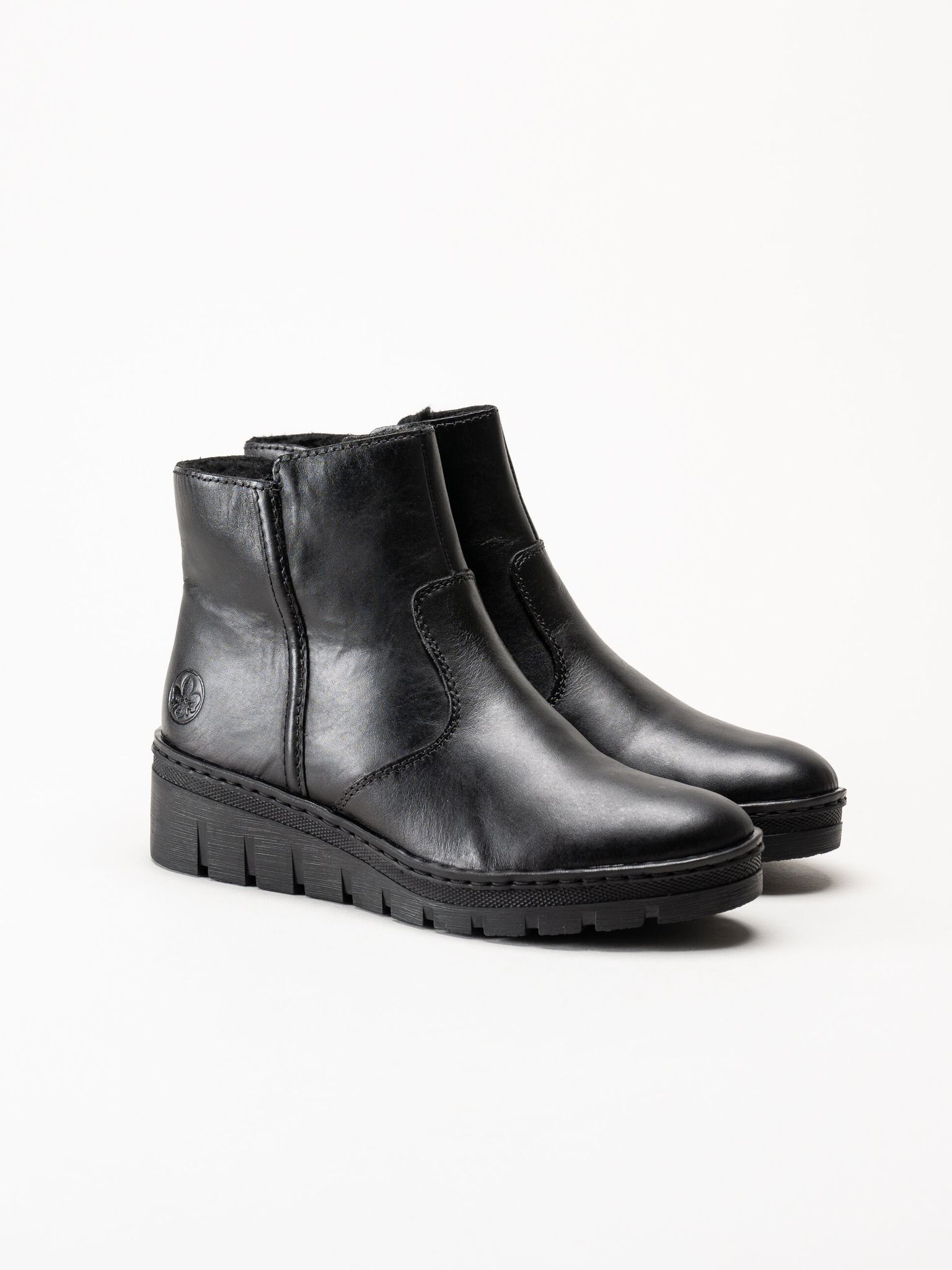 Rieker - Svarta fodrade kilklackade boots