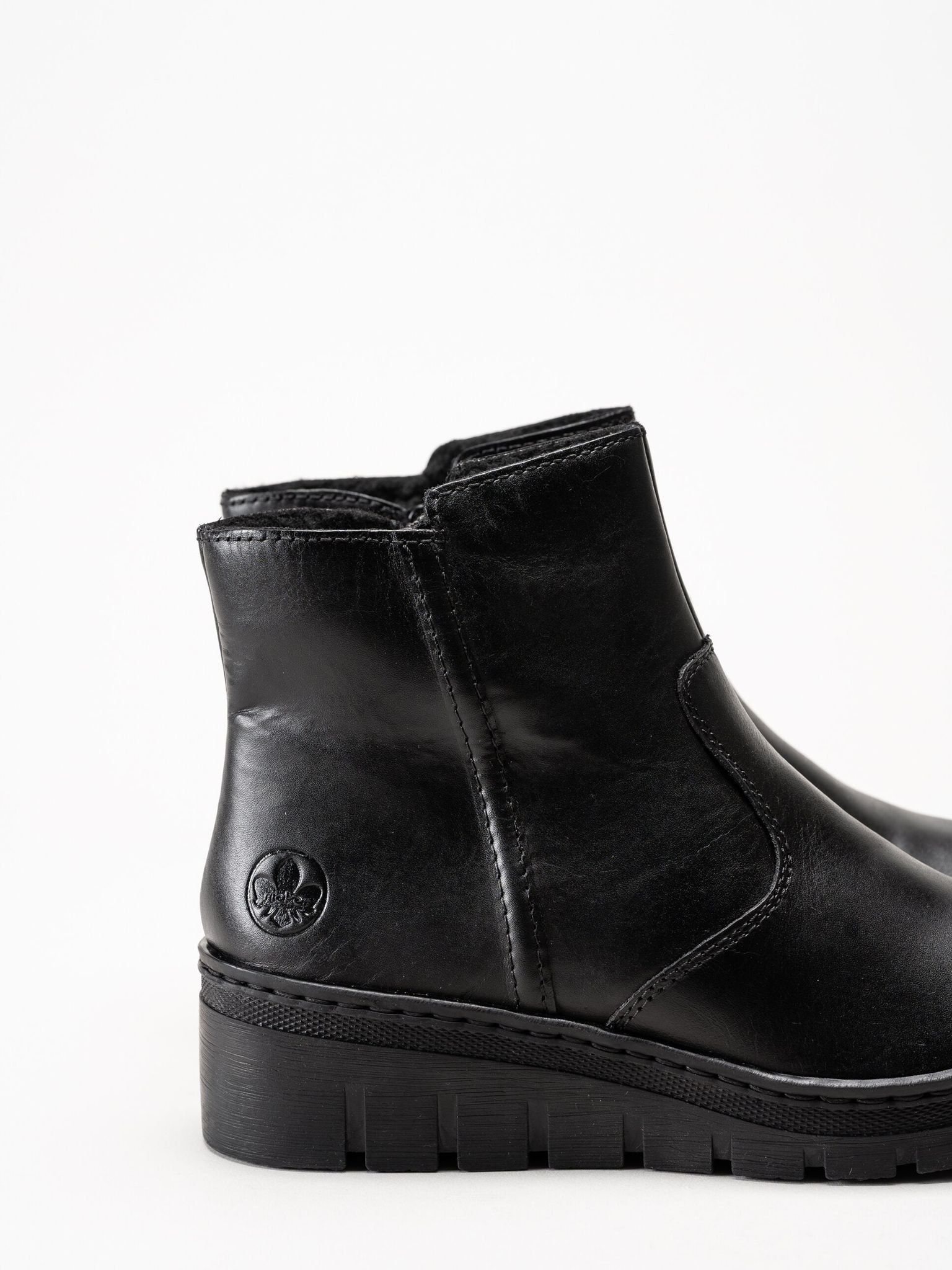 Rieker - Svarta fodrade kilklackade boots