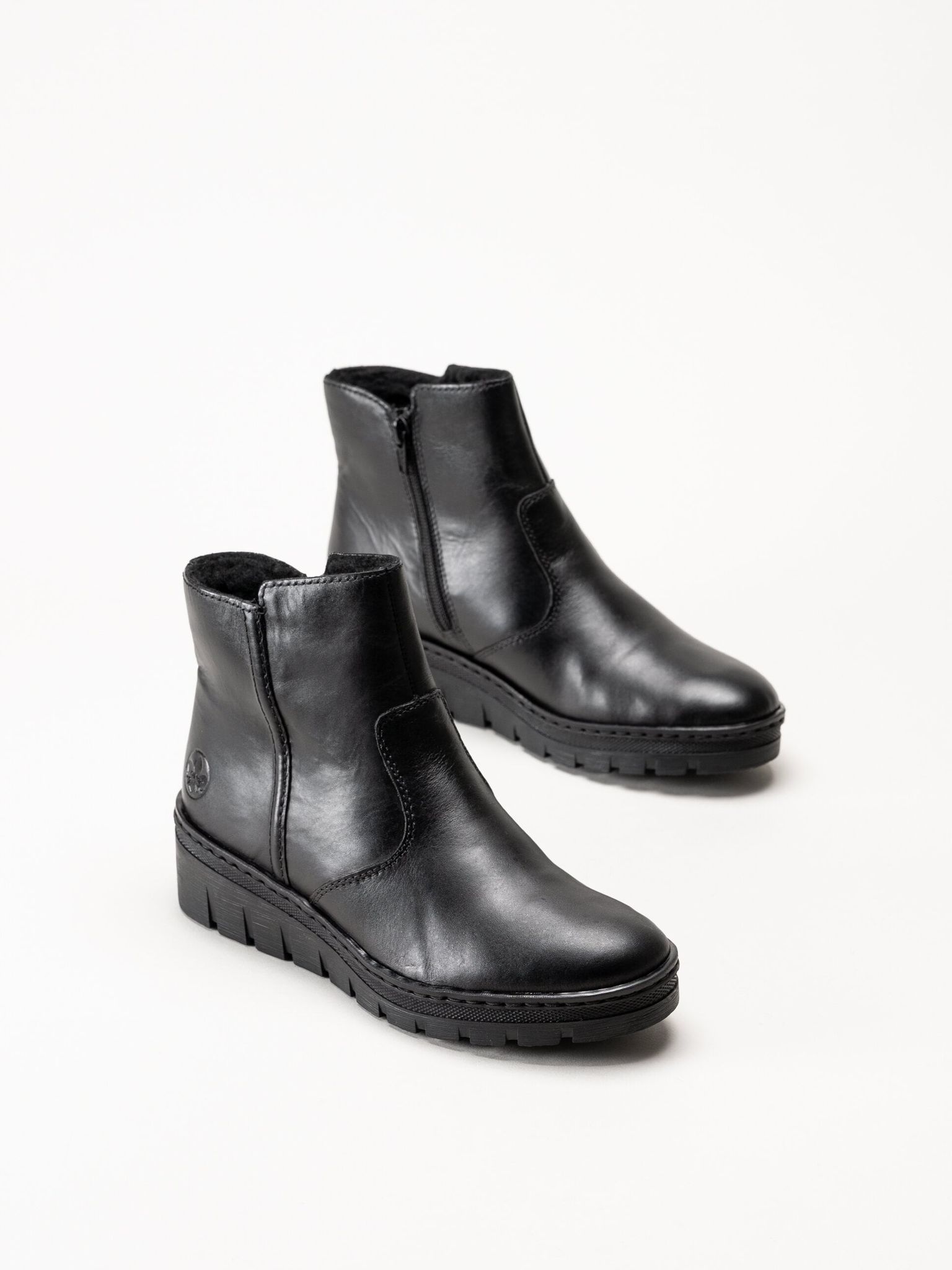 Rieker - Svarta fodrade kilklackade boots