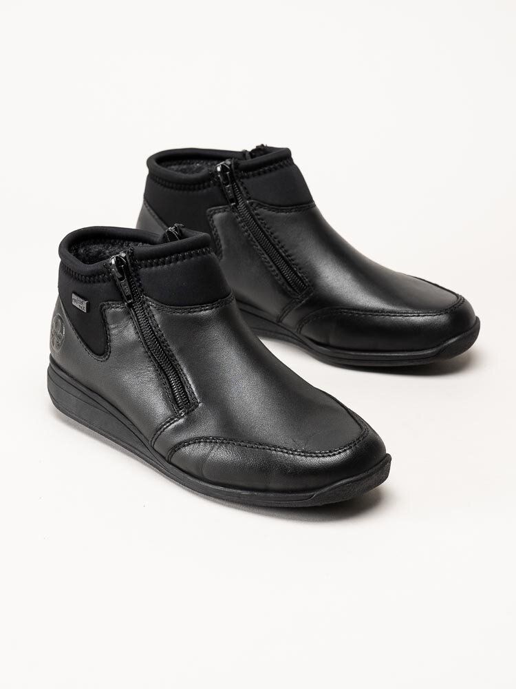 Rieker - Svarta boots i skinn och textil
