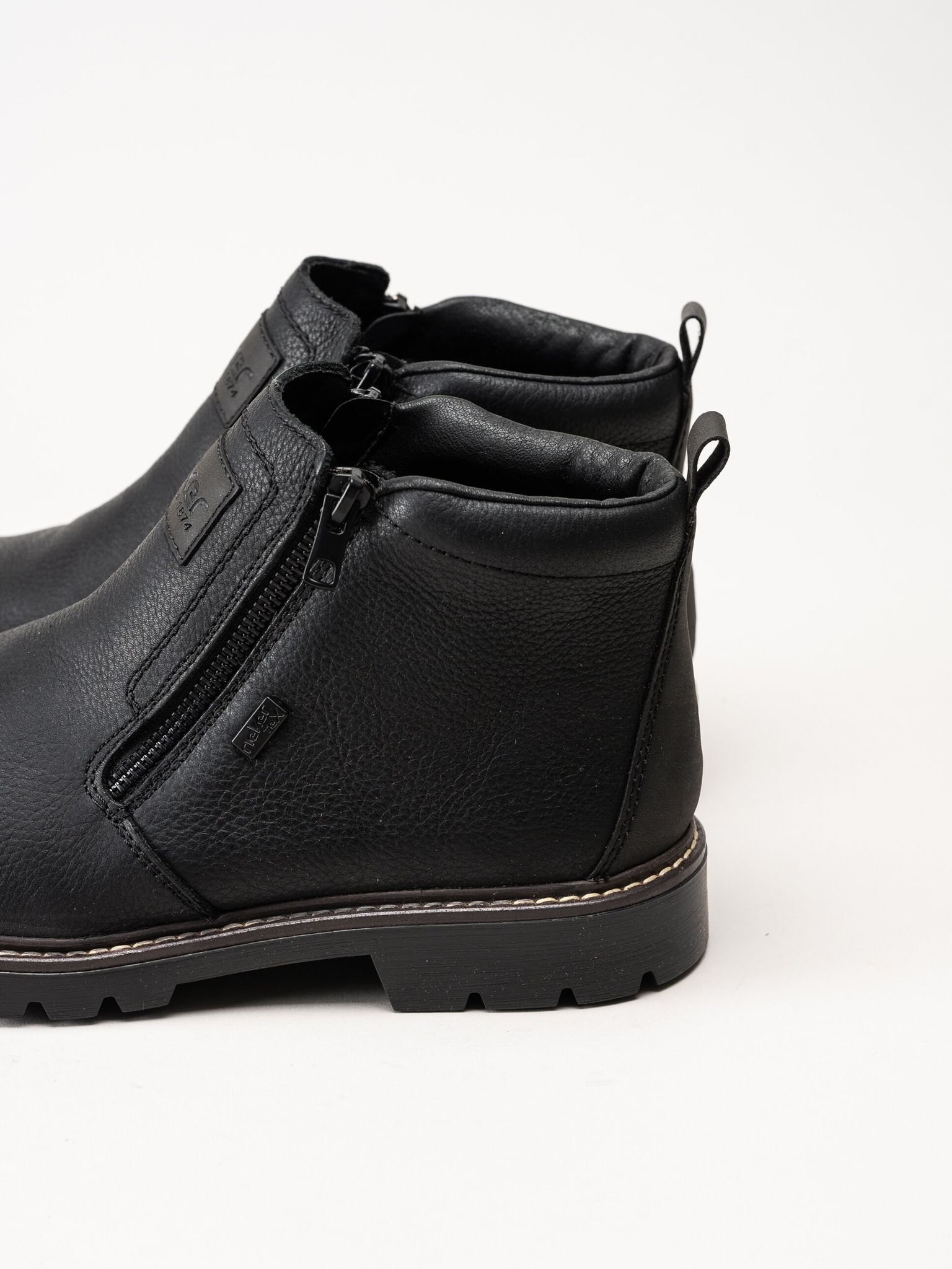 Rieker - Svarta fodrade boots i skinn