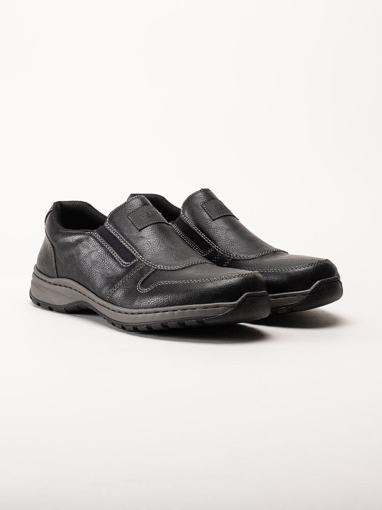 Rieker - Svarta slip on promenadskor