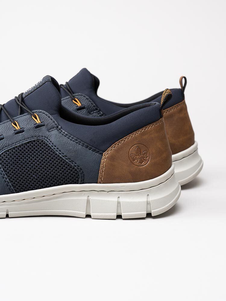 Rieker - Mörkblå sportiga slip on skor