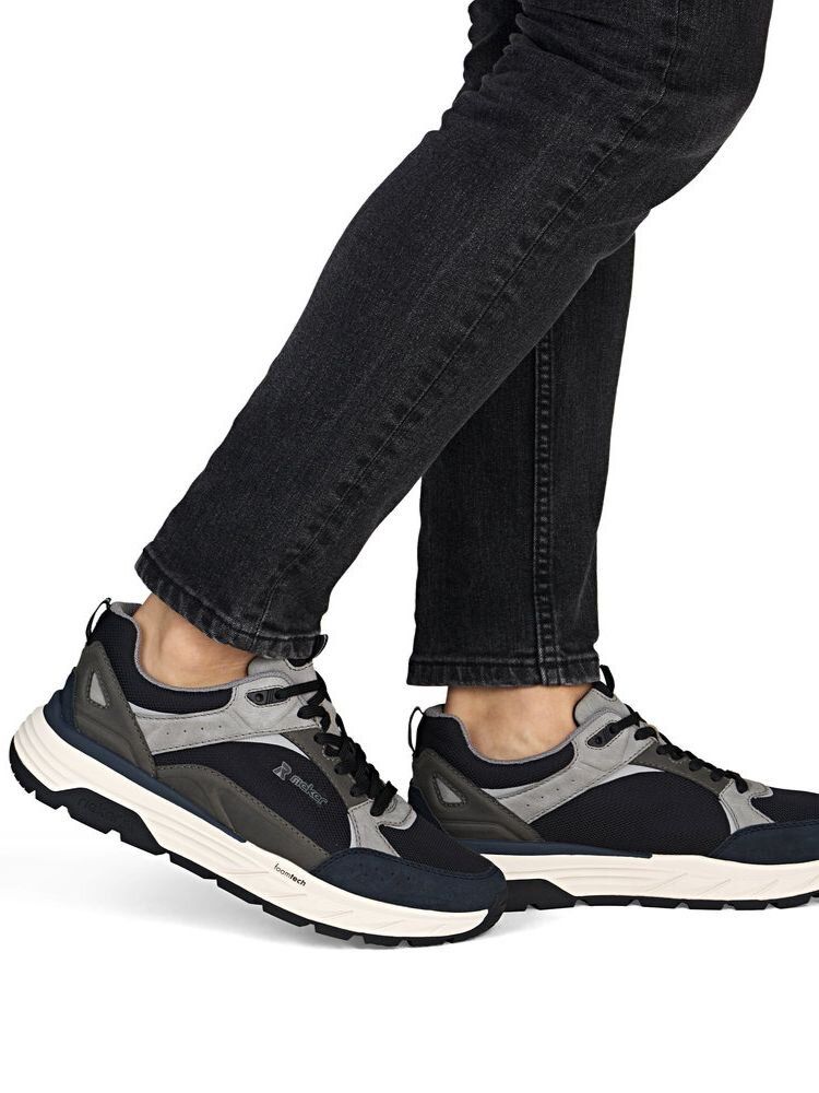 Rieker - Svarta sneakers i textil