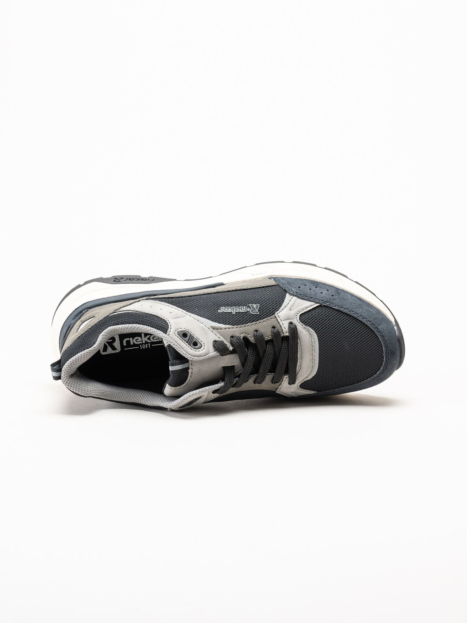 Rieker - Svarta sneakers i textil