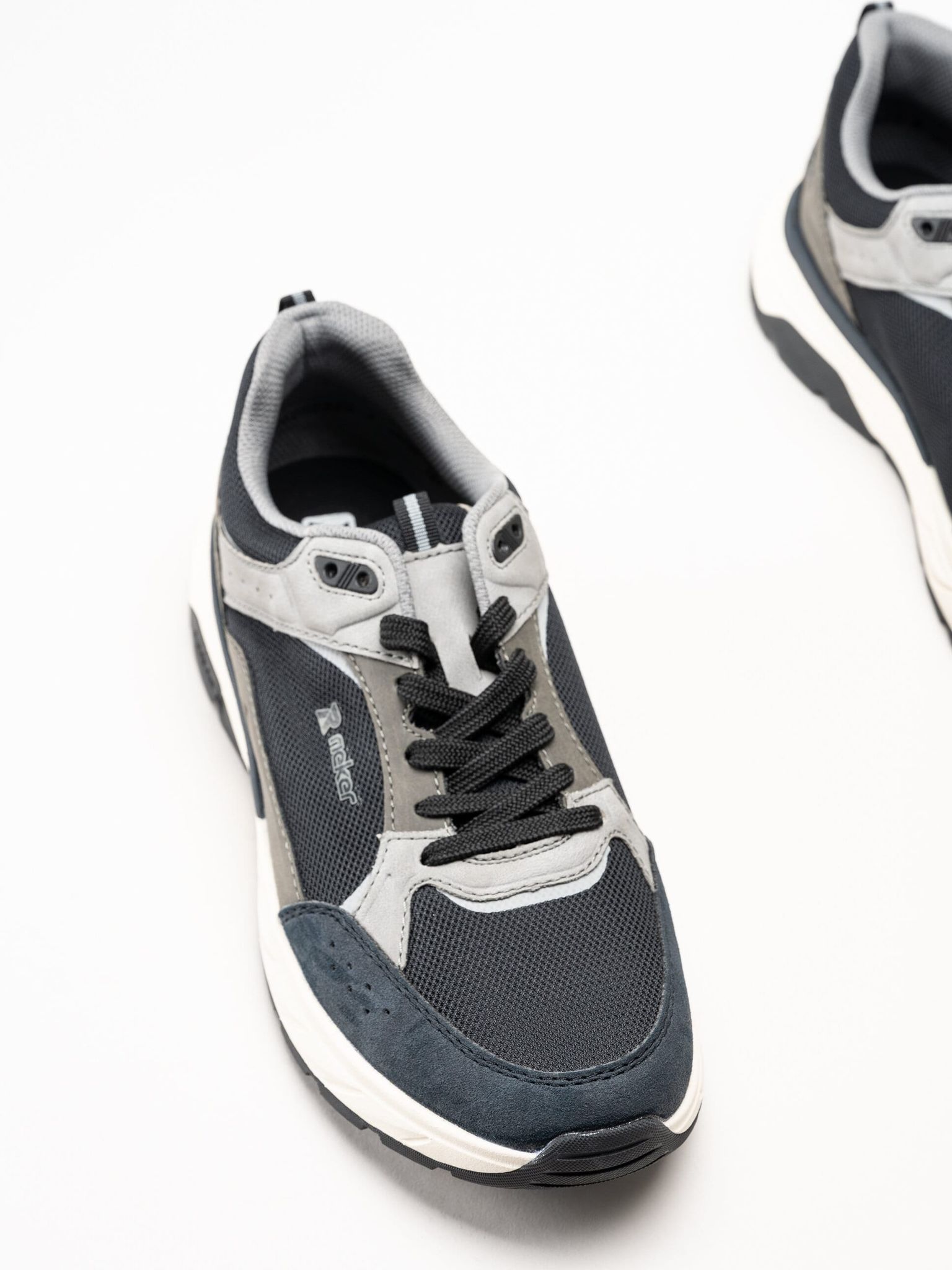 Rieker - Svarta sneakers i textil