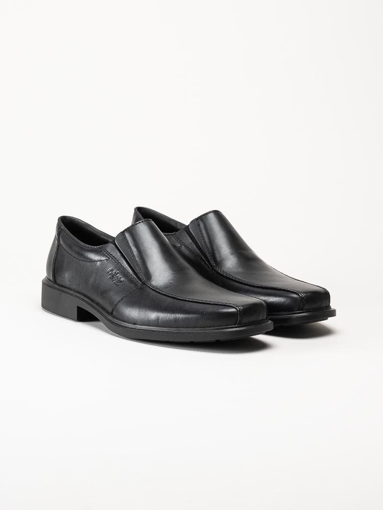 Rieker - Svarta slip on skor i skinn