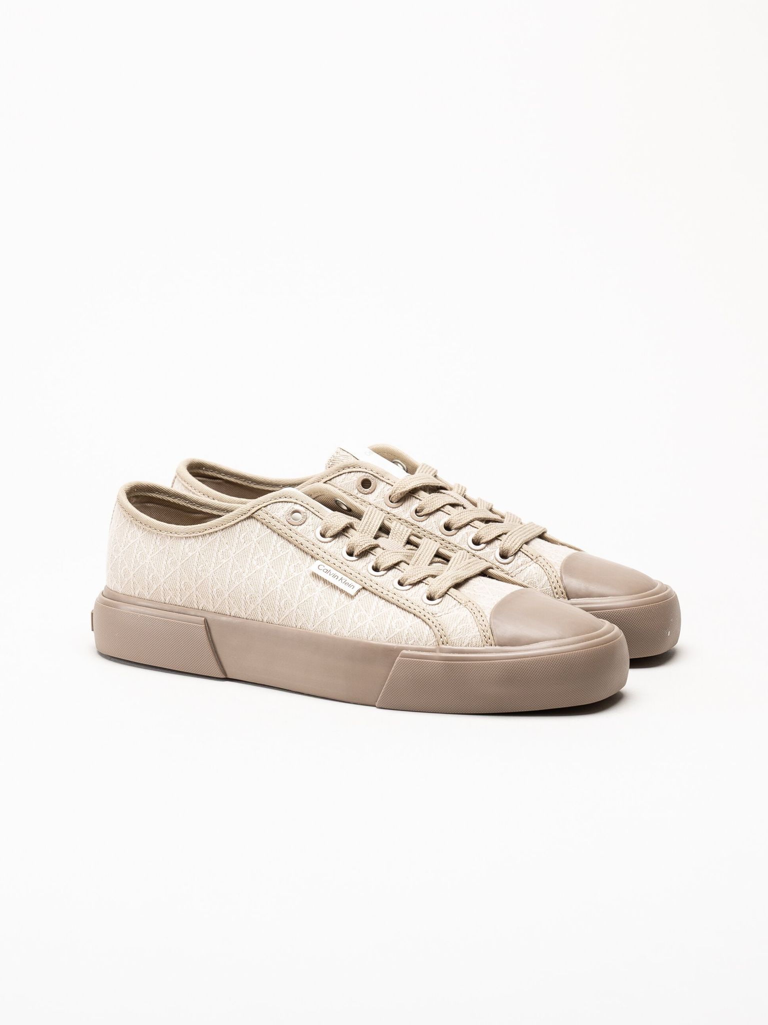 Calvin Klein - Vulc Low Laceup Aop - Beige sneakers i canvas