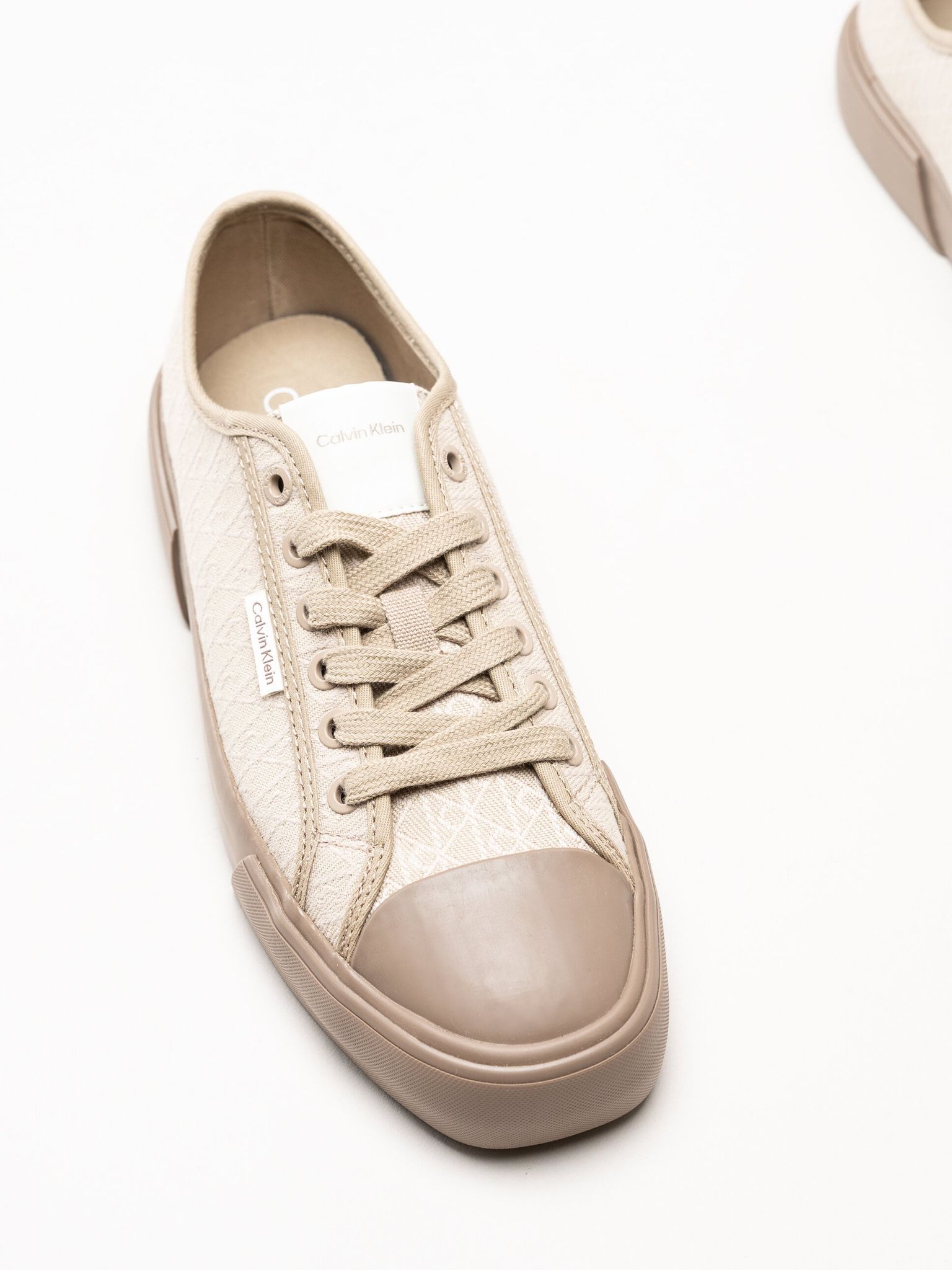 Calvin Klein - Vulc Low Laceup Aop - Beige sneakers i canvas