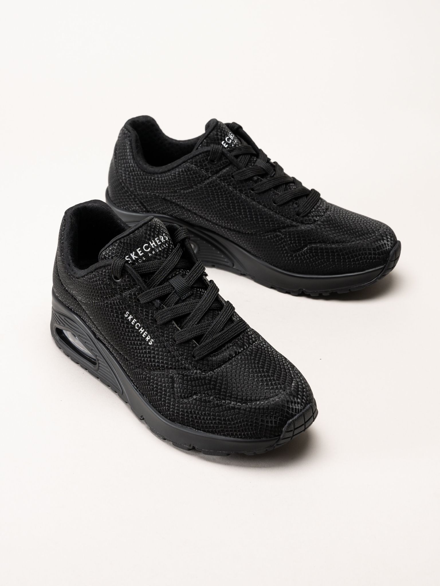 Skechers - Uno - Shiny Scale - Svarta sneakers med ormmönster