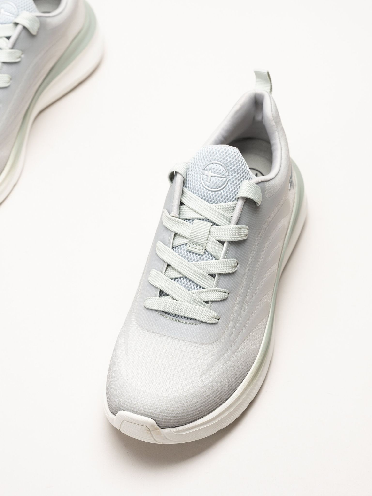 Tamaris - Wide fit - Ljusgröna sneakers i mesh