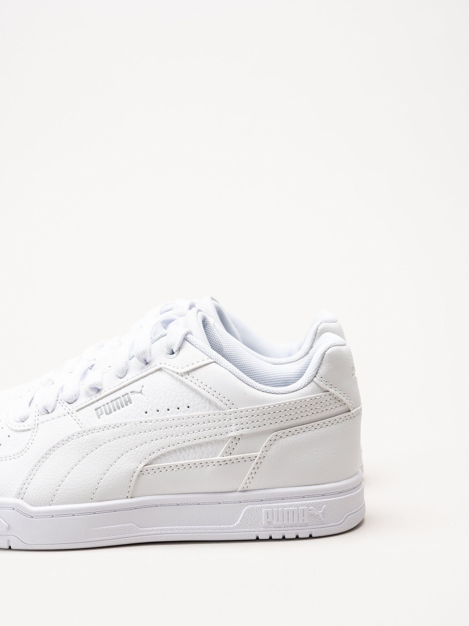 Puma - Caven III - Vita sneakers i skinnimitation