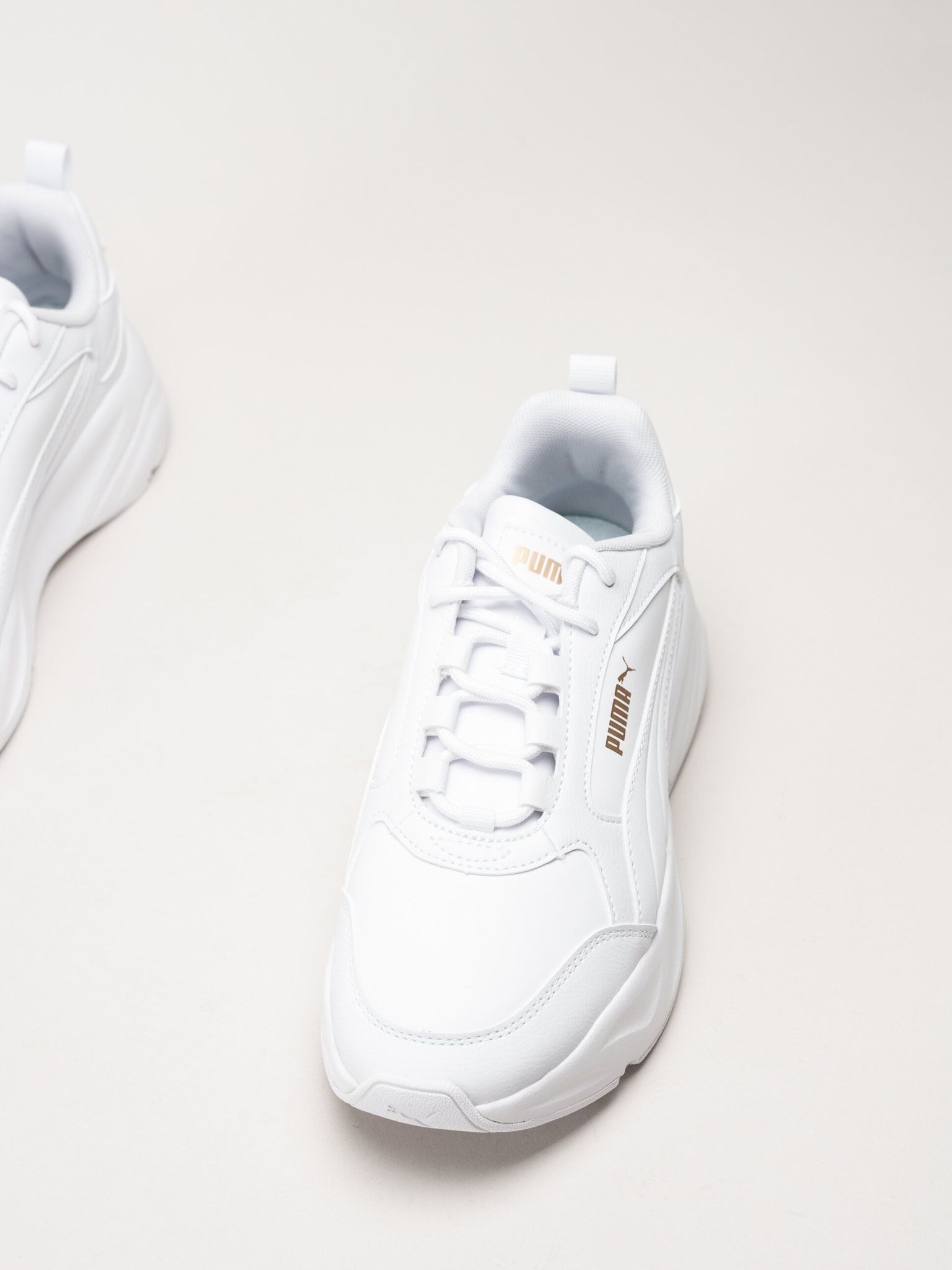 Puma - Cassia 2.0 - Vita sneakers i skinnimitation