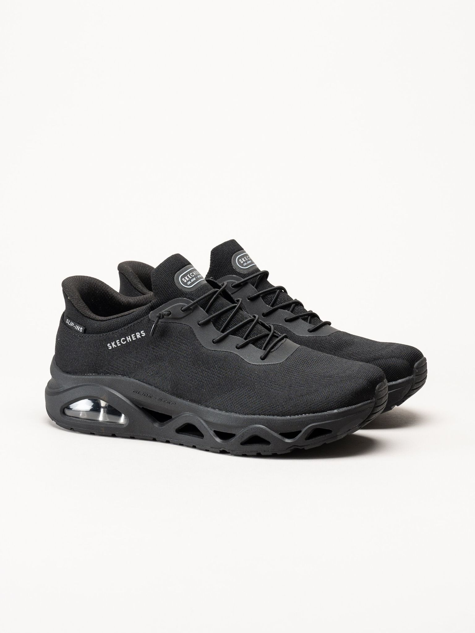 Skechers - Uno Glide Step - Svarta slip-ins sneakers i mesh