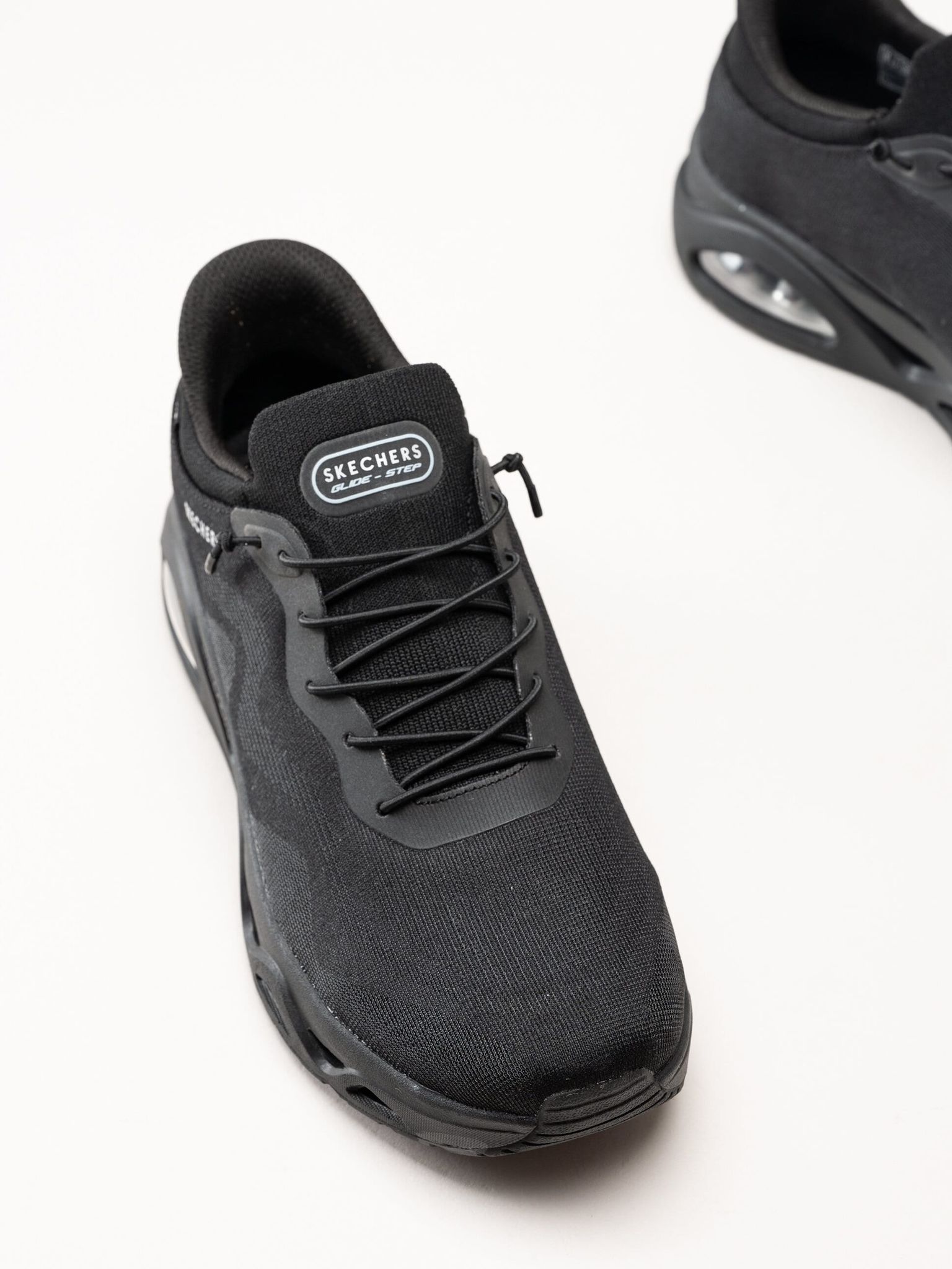 Skechers - Uno Glide Step - Svarta slip-ins sneakers i mesh