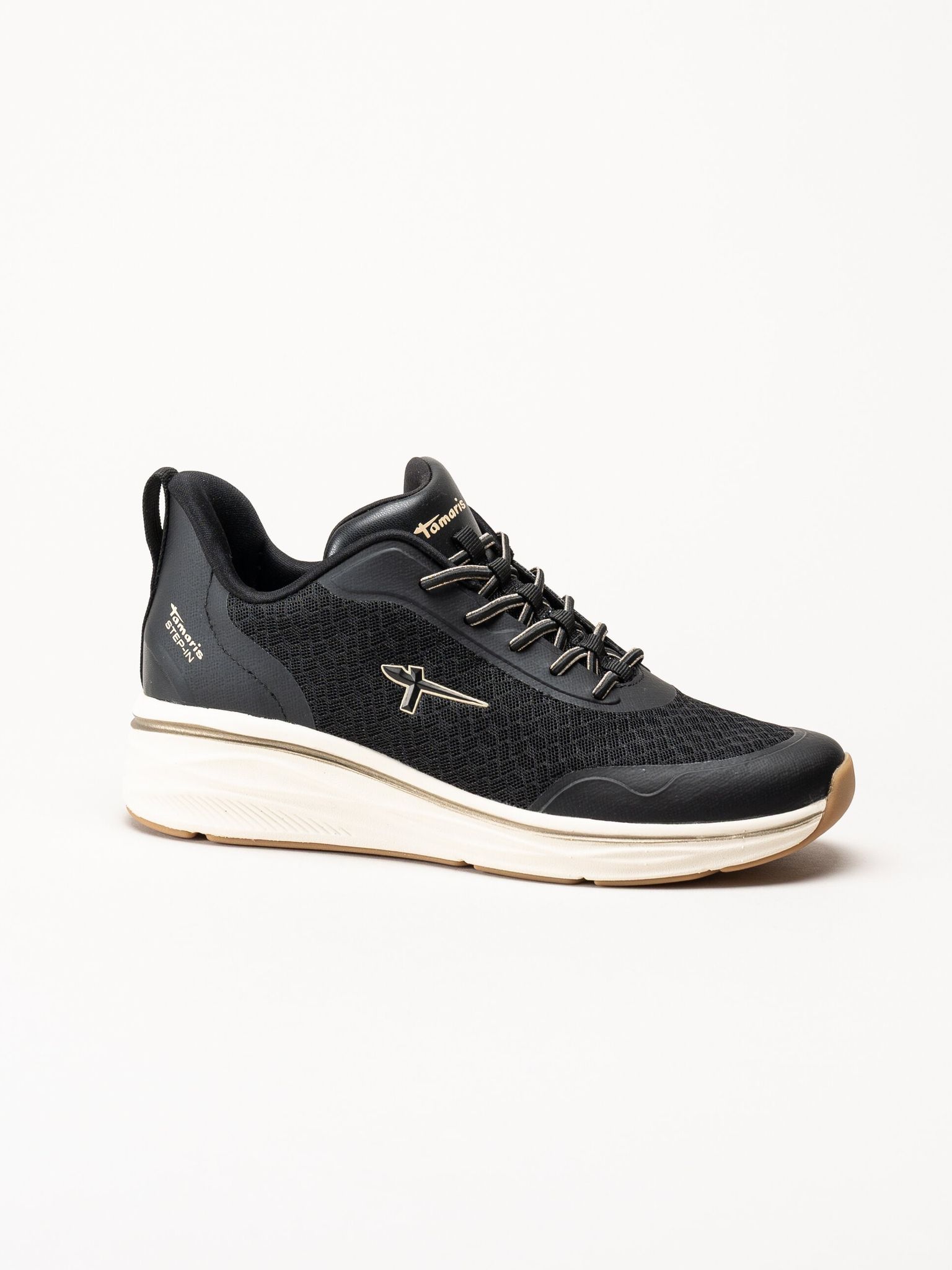 Tamaris - Svarta sneakers med kilklack