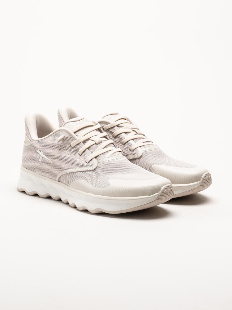 Tamaris - Beige sportiga sneakers i textil