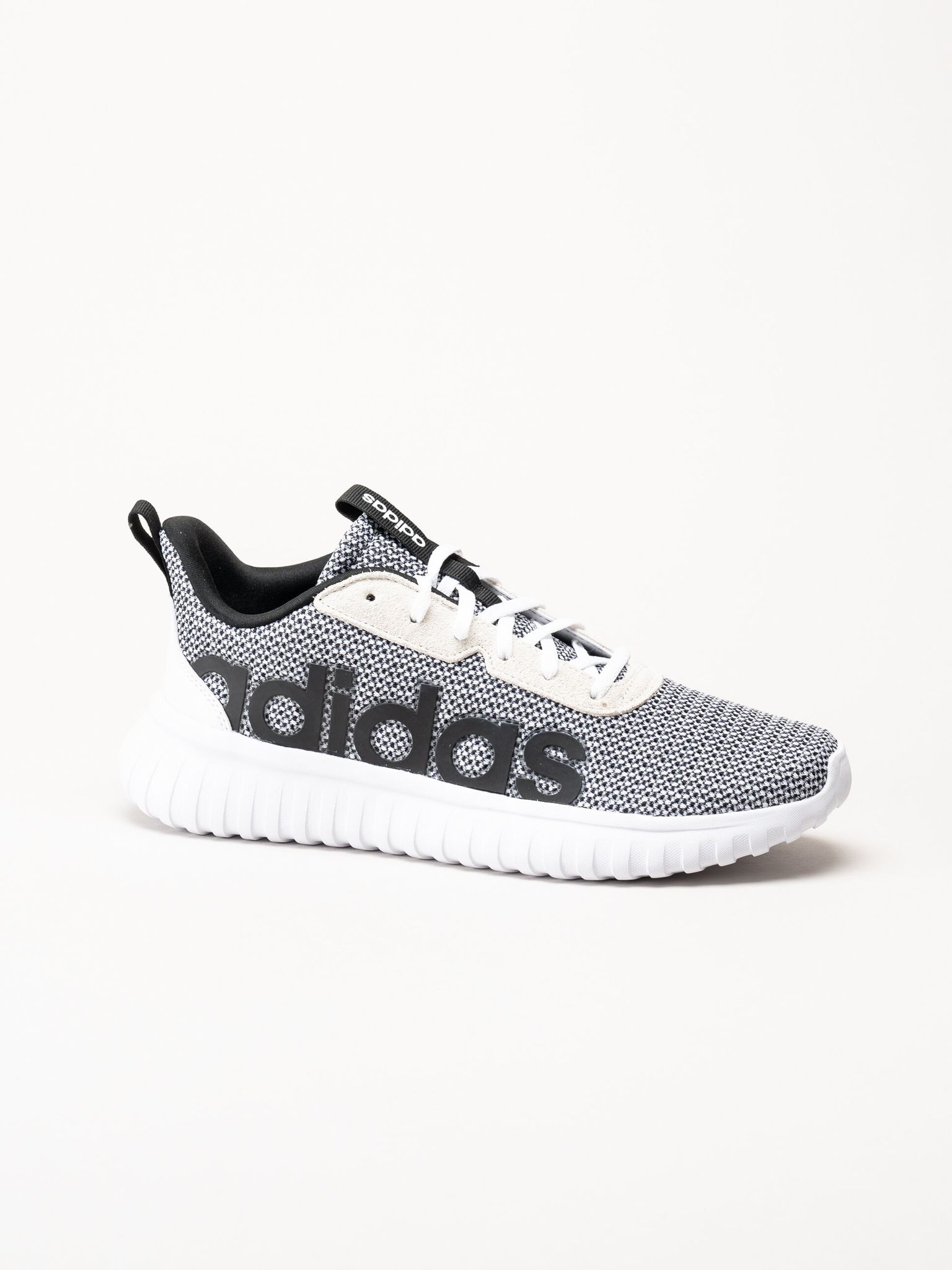 Adidas - Kaptir Base - Svartvita sneakers i textil