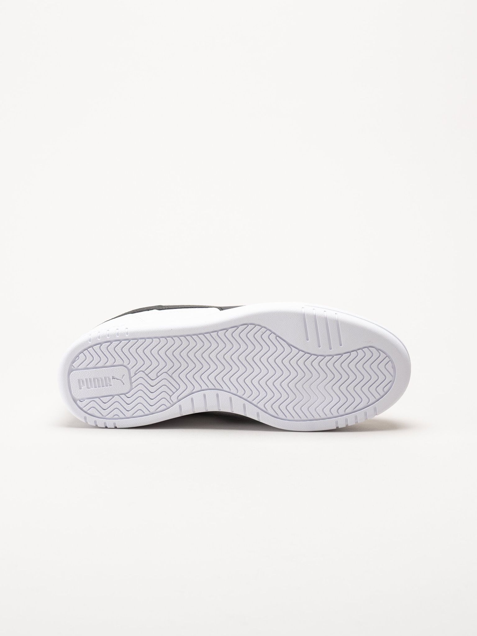 Puma - Caven III - Vita sneakers i skinnimitation