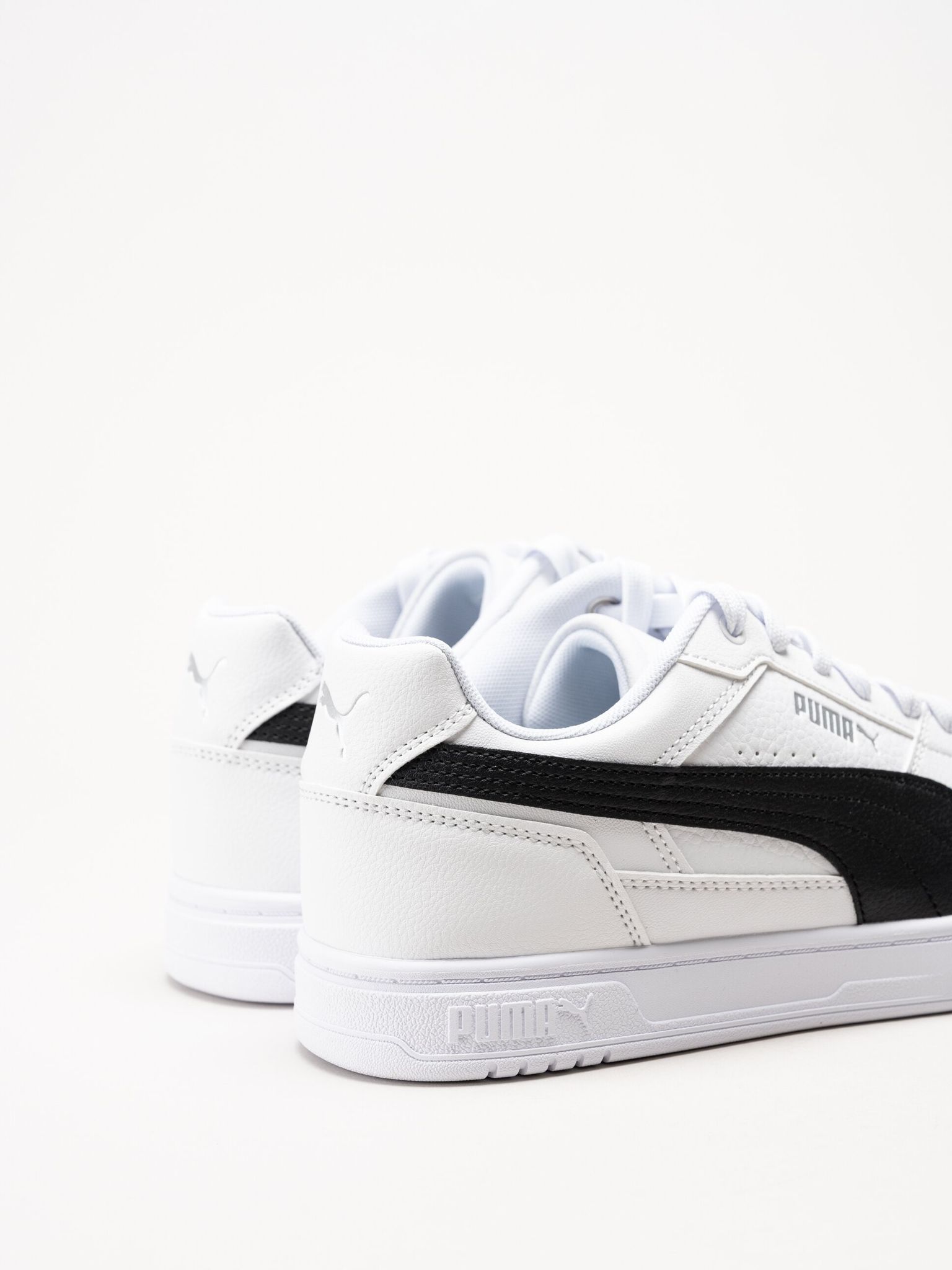 Puma - Caven III - Vita sneakers i skinnimitation