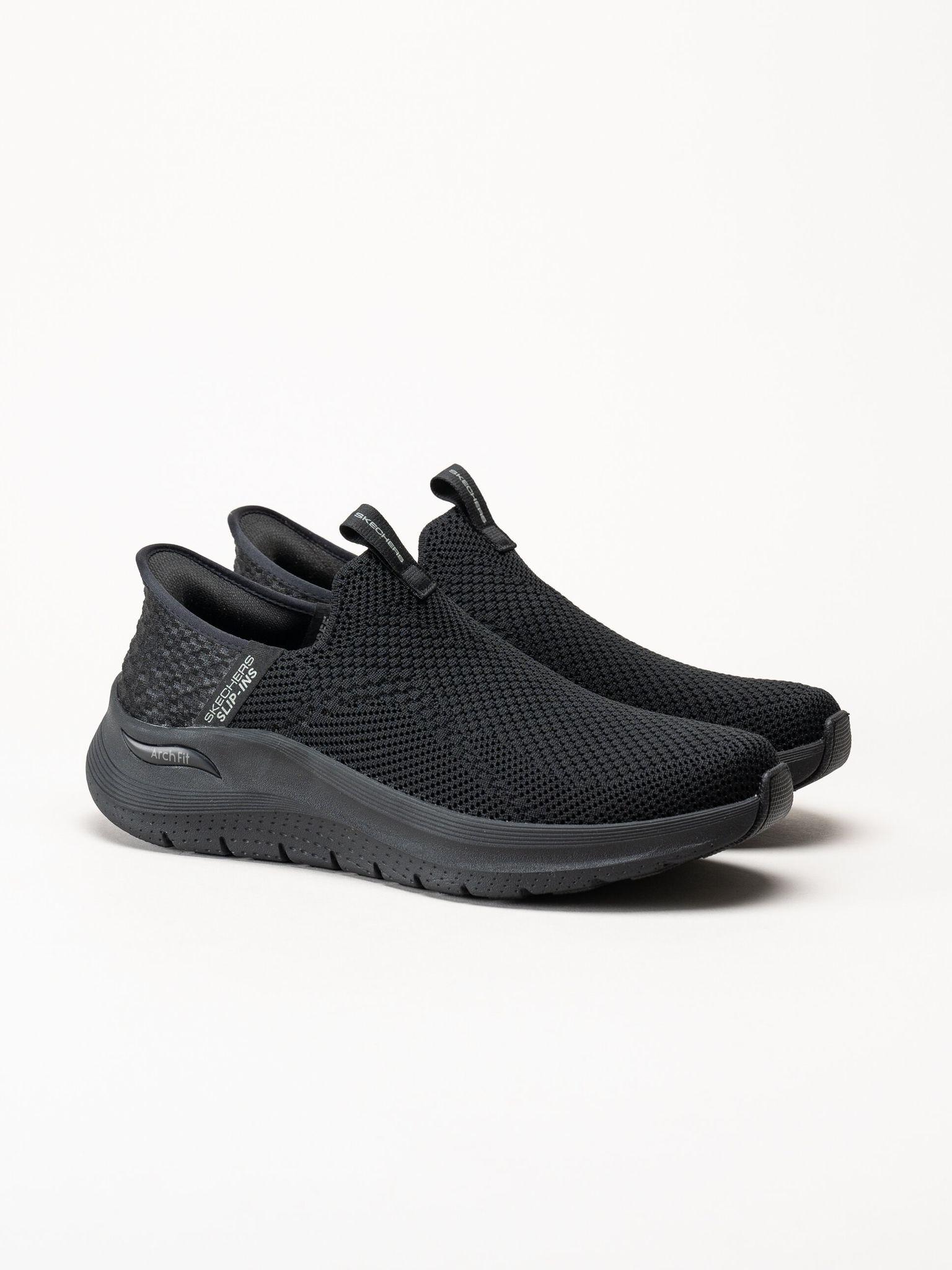Skechers - Arch Fit 2.0 Crayn - Svarta slip-ins sneakers i mesh