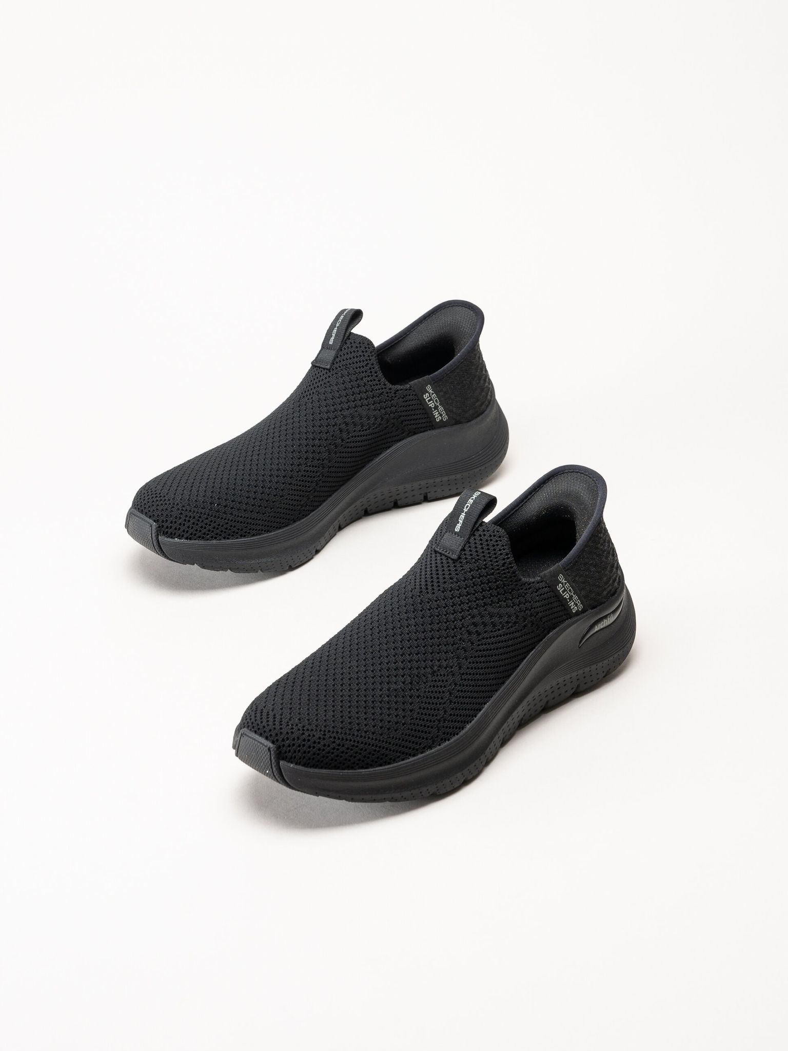 Skechers - Arch Fit 2.0 Crayn - Svarta slip-ins sneakers i mesh