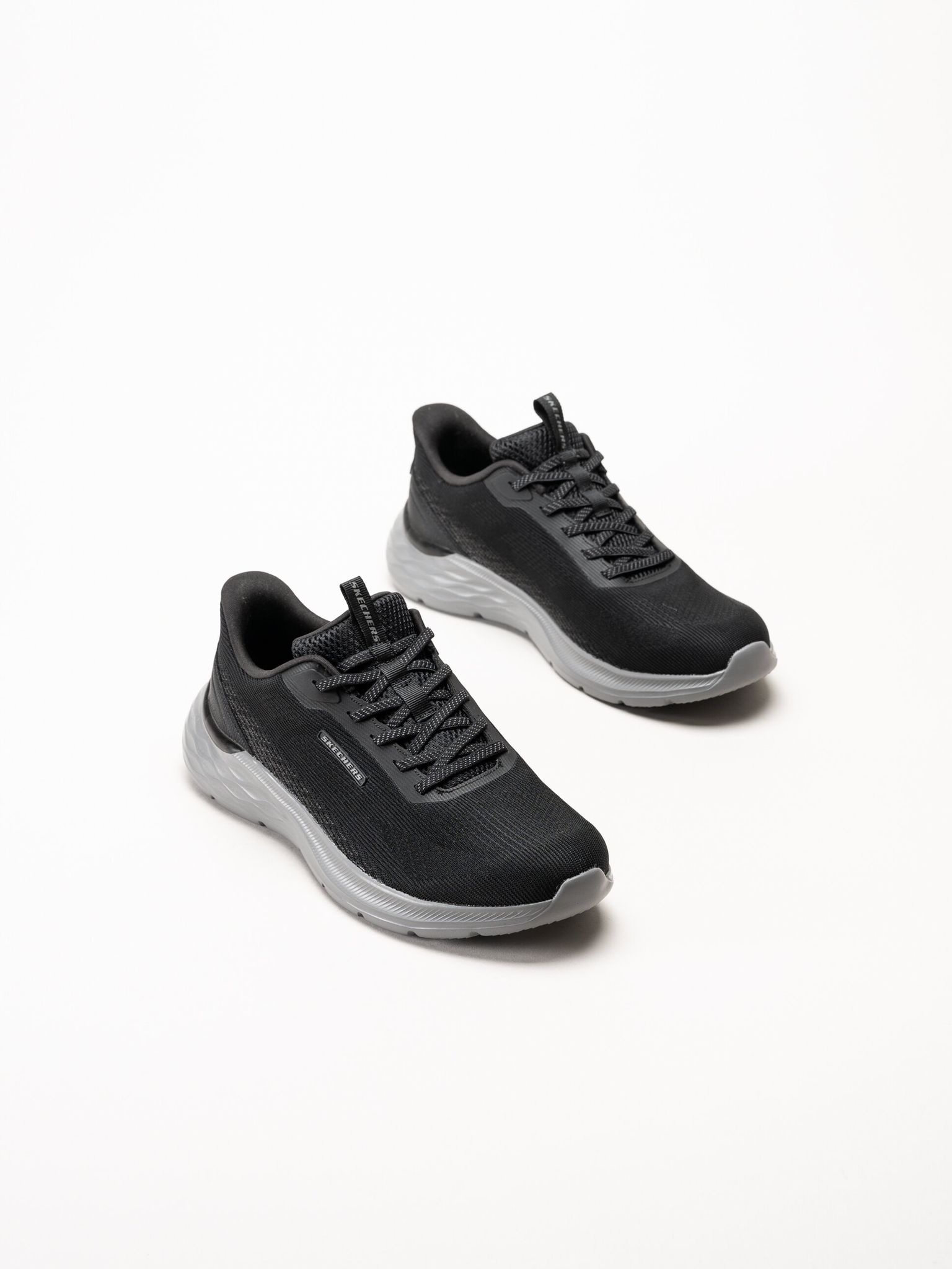 Skechers - Slip-Ins Garner - Svarta slip-ins sneakers i mesh