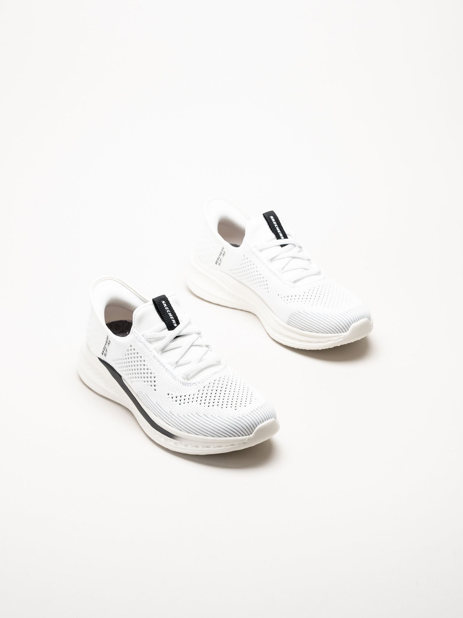 Skechers - Relaxed Fit - Vita slip-ins sneakers i stickad textil