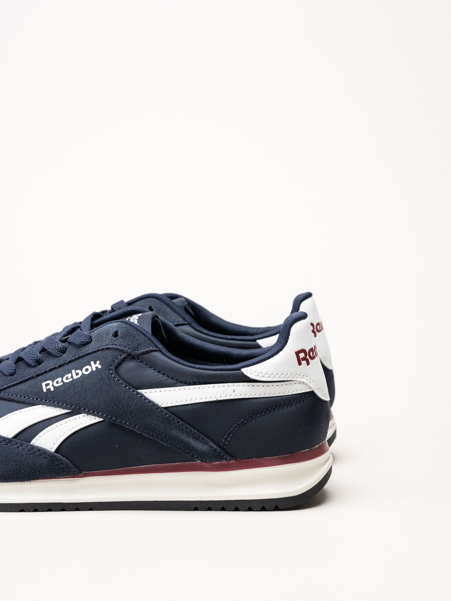 Reebok - World 70 - Mörkblå sneakers i mocka  och textil