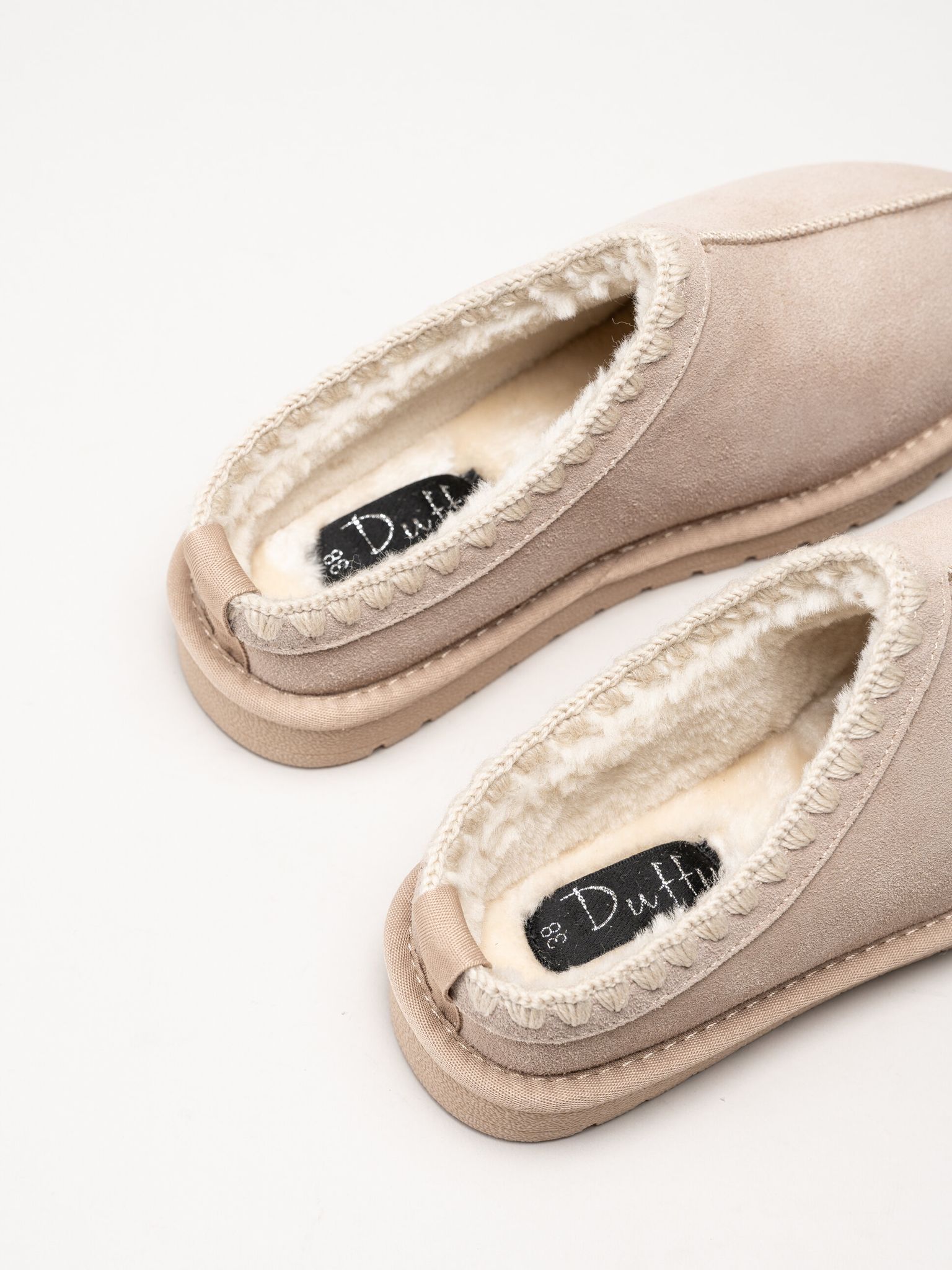 Duffy - Beige varmfodrade tofflor i mocka