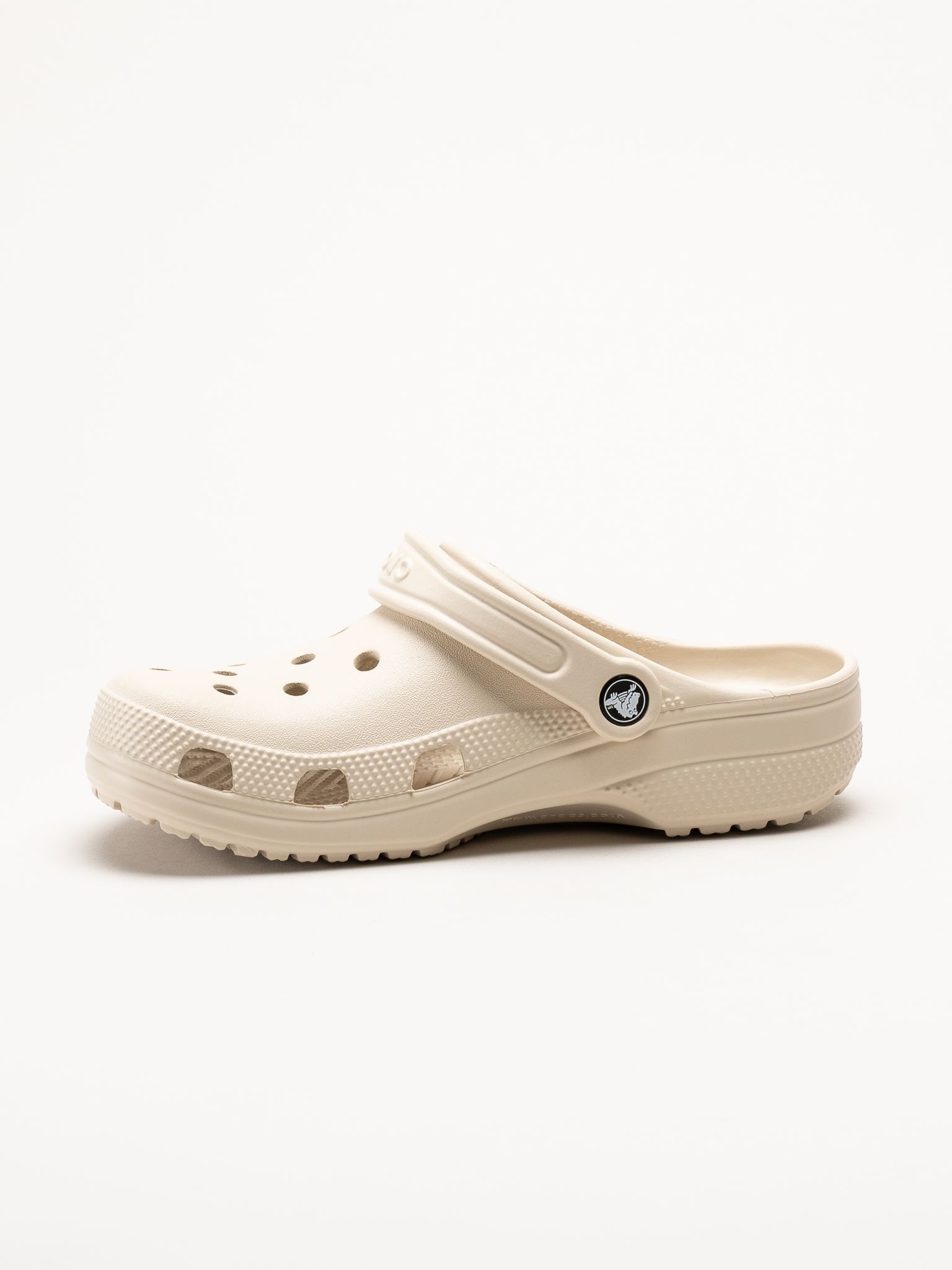 Crocs - Classic - Beige slip in tofflor