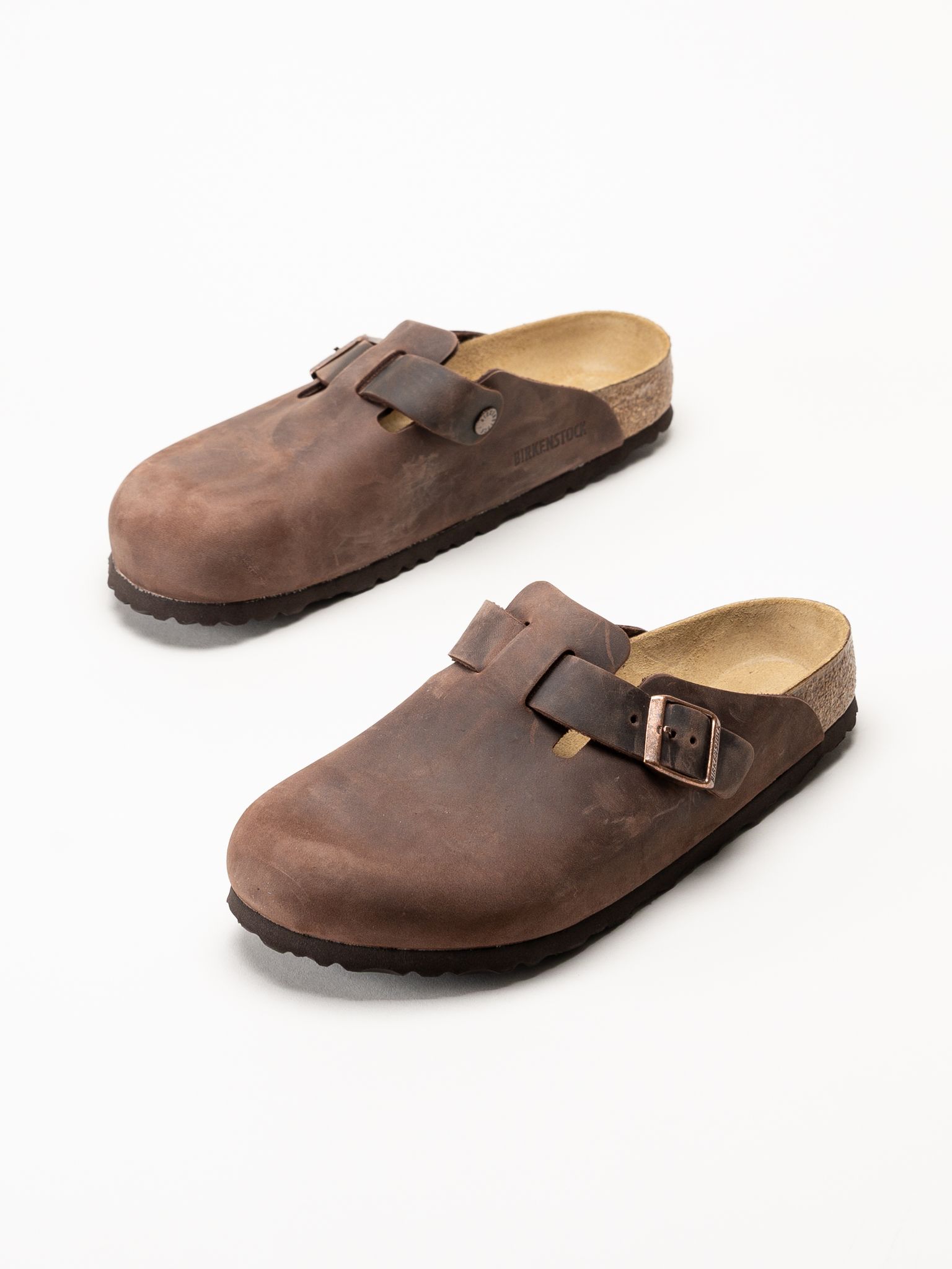 Birkenstock - Boston - Mörkbruna slip-in sandaler i oljat skinn