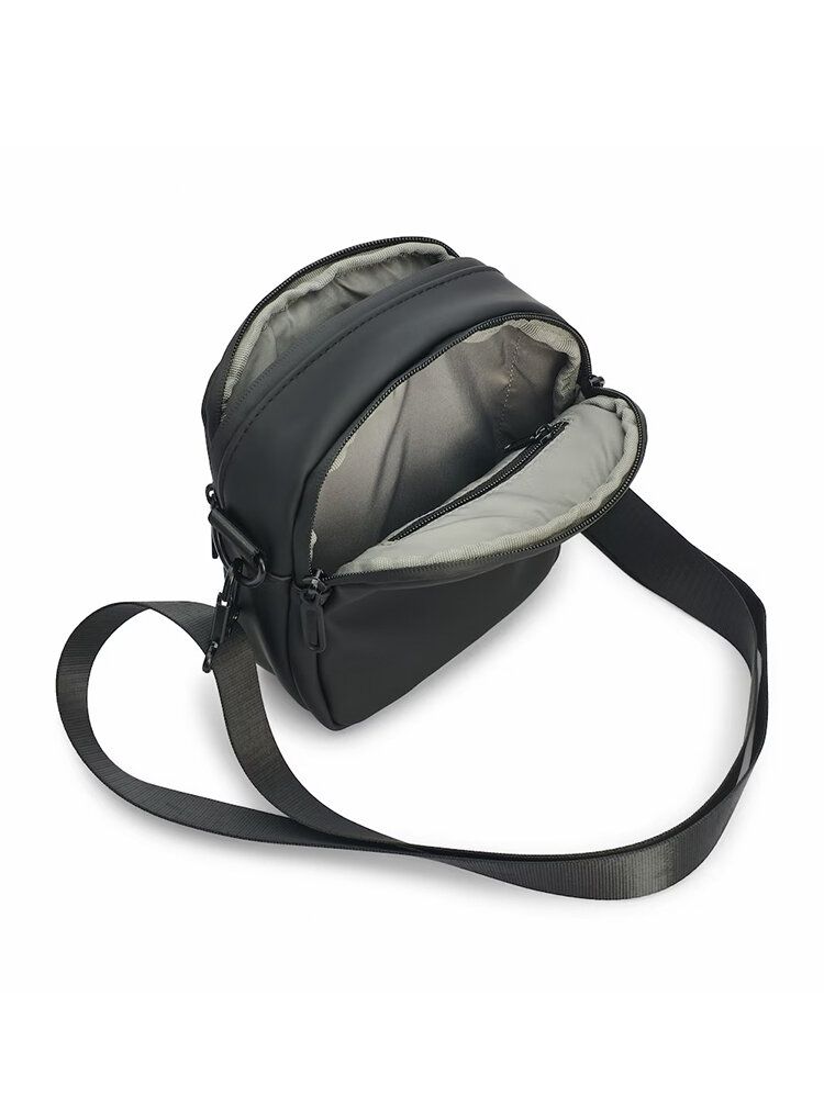 Tretorn - PU Crossbody Bag - Svart vattentålig crossbodyväska