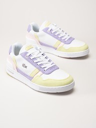 Lacoste - T-Clip - Vita sneakers med rosa, lila och gröna detaljer