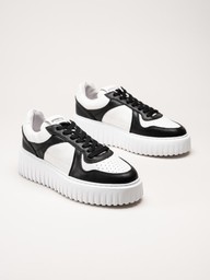 Philip Hog - Nina - Svart-vita platåsneakers i skinn