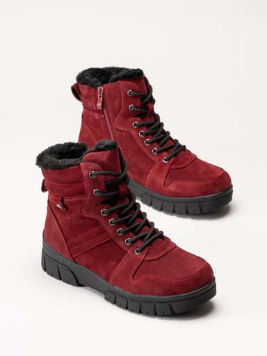 Vinröda, pälsfodrade ankelboots med snörning och kraftiga svarta sulor