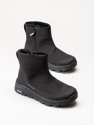 Svarta fleecefodrade ankelboots med sidodragkedjor och robusta sulor