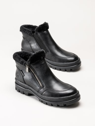 Svarta pälskantade ankelboots med sidodragkedja och kraftiga sulor