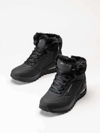 Svarta ankelboots från Skechers med kragar i fuskpäls