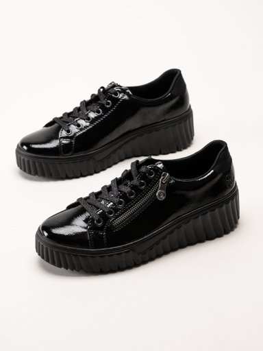 Rieker - Svarta platåsneakers i skinn-lack