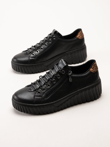 Svarta sneakers i skinn