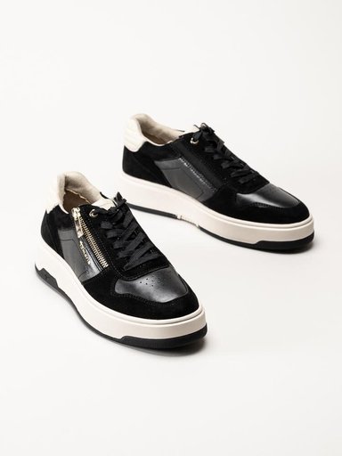 Tamaris - Svarta sneakers i skinn och mocka