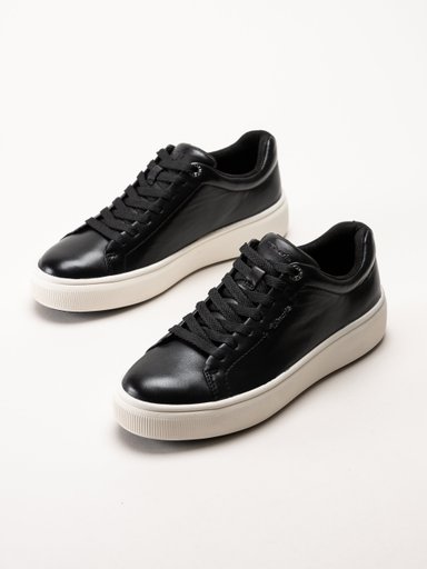 Tamaris - Svarta sneakers i skinn med platåsula