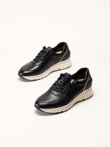 Tamaris - Svarta sneakers i skinn