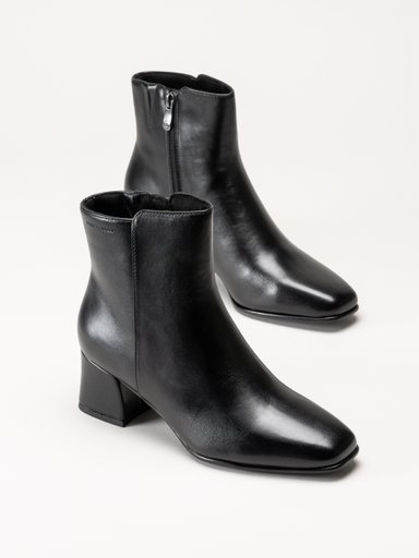 Svarta ankelboots i läder med sidodragkedjor och blockklackar